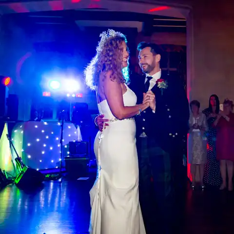 Wedding photo of the bride and groom's first dance at Fanhams Hall, Ware, Hertfordshire.  – photography by Glen Smith