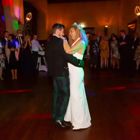 Wedding photo of the bride and groom's first dance at Fanhams Hall, Ware, Hertfordshire.  – photography by Glen Smith