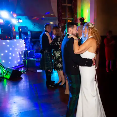 Wedding photo of the bride and groom's first dance at Fanhams Hall, Ware, Hertfordshire.  – photography by Glen Smith
