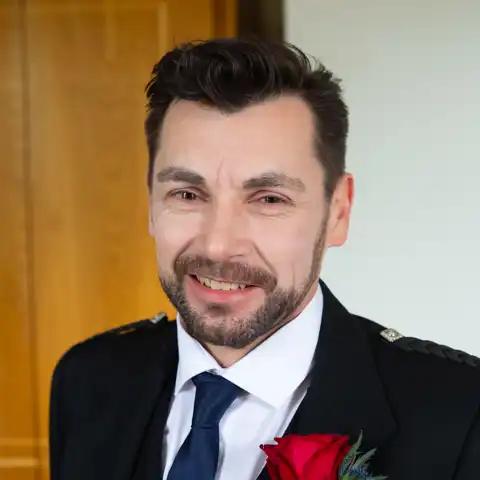 Wedding photo of the groom, best man and ushers at Fanhams Hall, Ware, Hertfordshire.  – photography by Glen Smith